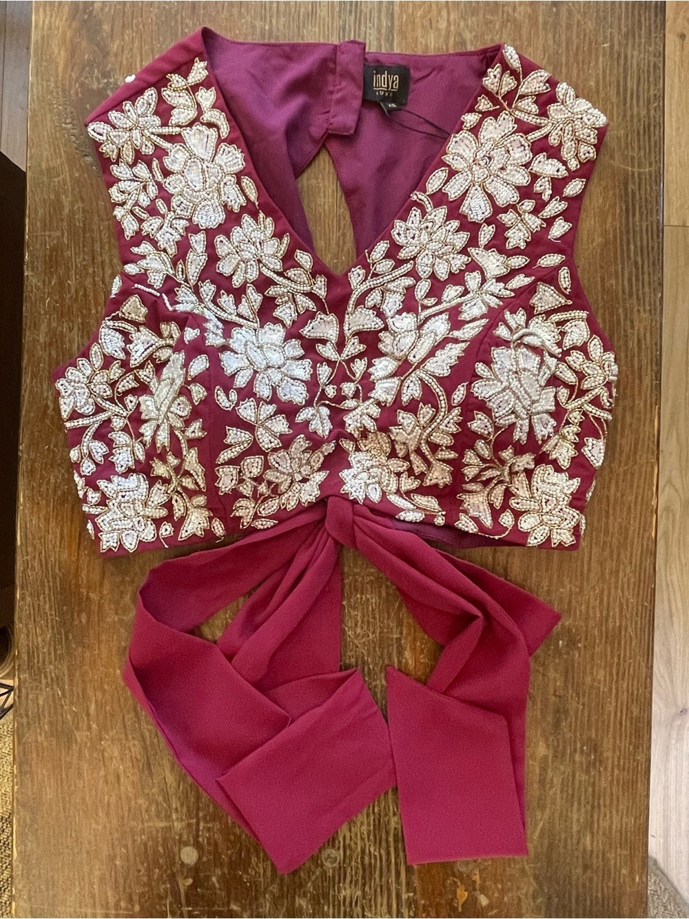 maroon Indya Luxe embroidered crop top with a V-neckline & tie-up back choli